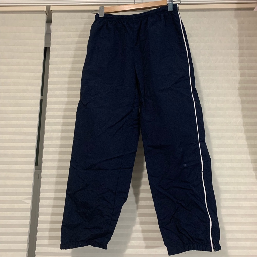 Navy Nylon sweatpants with white line on the side